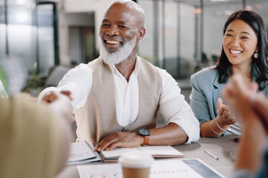 Handshake, clapping or happy business people in meeting in office for contract negotiation success. Job interview, shaking hands or senior black man with human resources for recruitment opportunity.